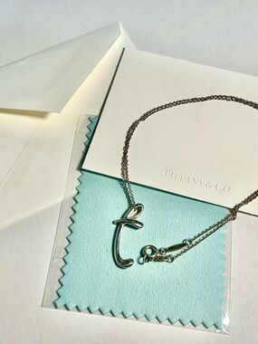 Authentic Tiffany & Co. Silver 'T' Pendant Necklace with Signature Peretti